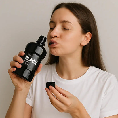 BAIN DE BOUCHE AU CHARBON ACTIF CONTRE TACHES SUPERFICIELLES DES DENTS - 80 ML